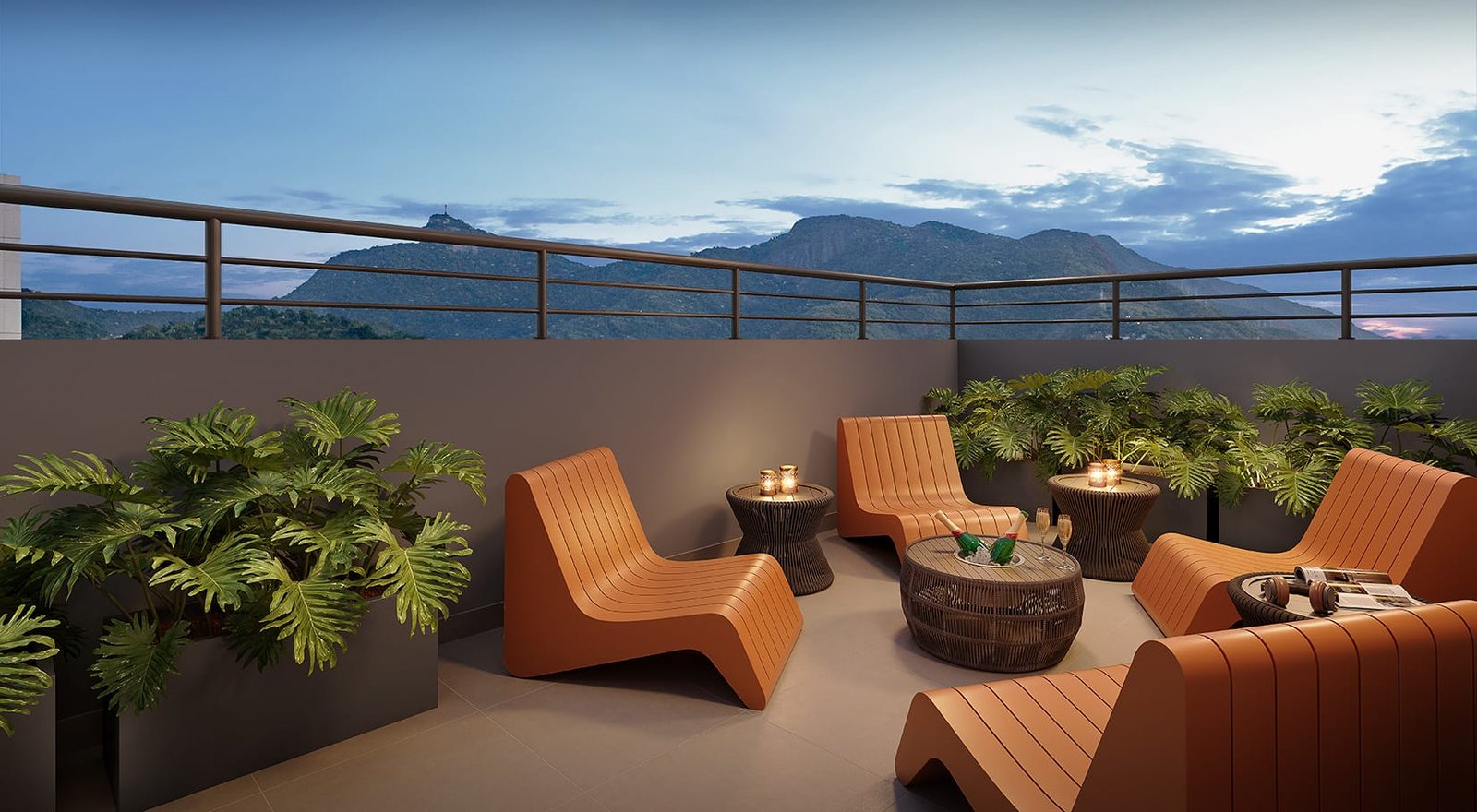Lounge do rooftop da Saudosa Praça Onze com vista para as montanhas